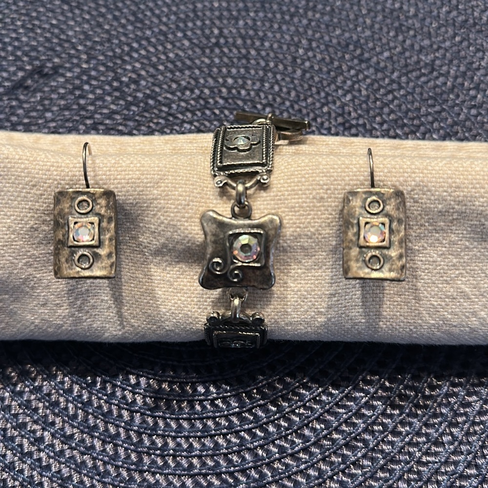 Silver 8” Bracelet/Earrings by AVGAD jewelers.